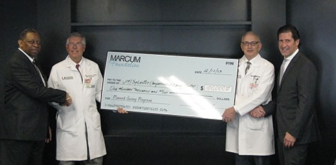 Check presentation to UM Sylvester